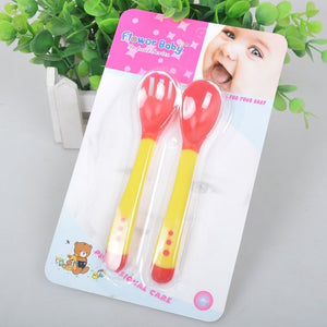 red-spoon-fork-yellow-handle